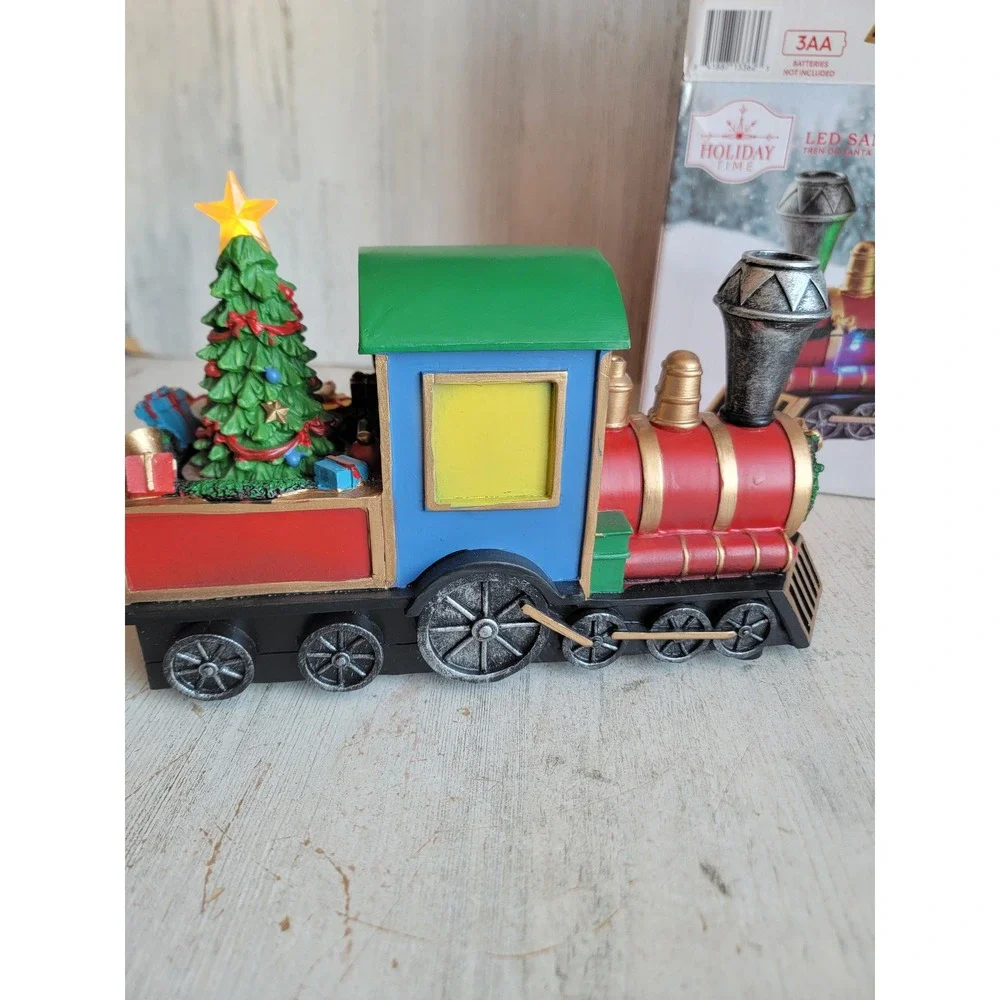 Holiday time light up Santa claus musical train‎ conductor tree candy cane